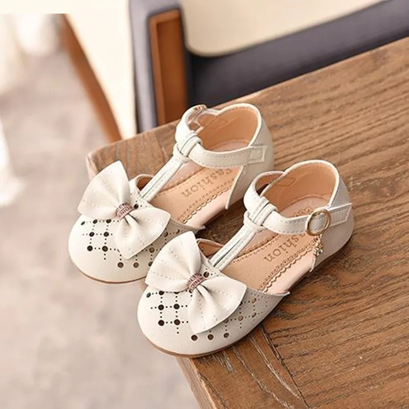 Детские кожаные сандалии новые детская летняя обувь для девочек детские с бантом