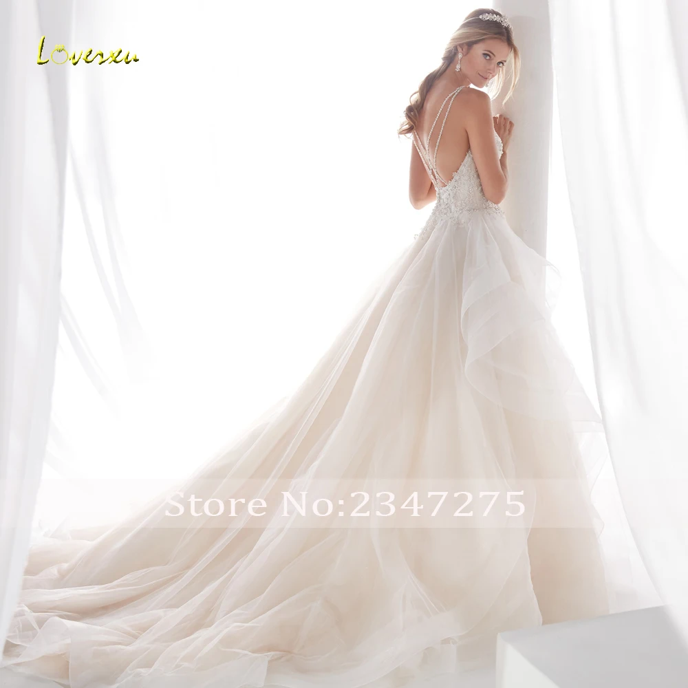 

Loverxu Sexy Backless V Neck Ruffles A Line Wedding Dress 2019 Luxury Appliques Beaded Spaghetti Straps Vintage Bridal Gowns