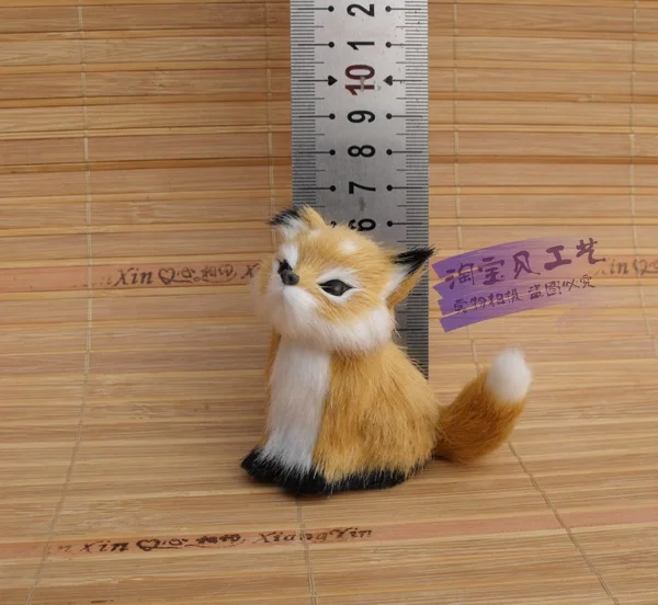 

cute mini simulation sitting fox toy lifelike small yellow fox doll gift about 7x4x7cm
