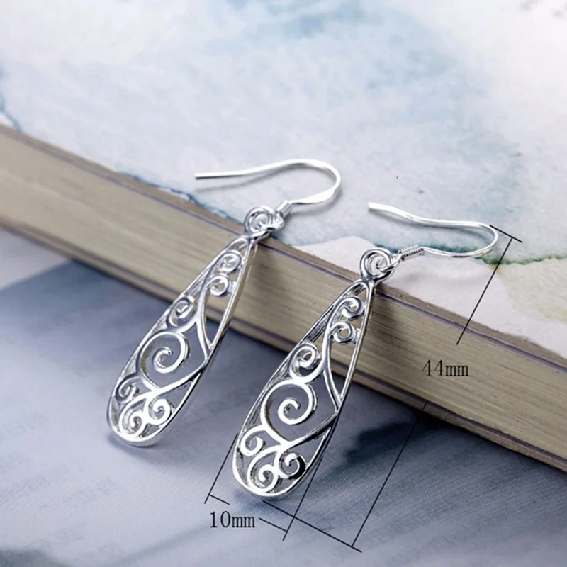 Оформление c резными выемками снаружи очарование серьги для женщин Этнический