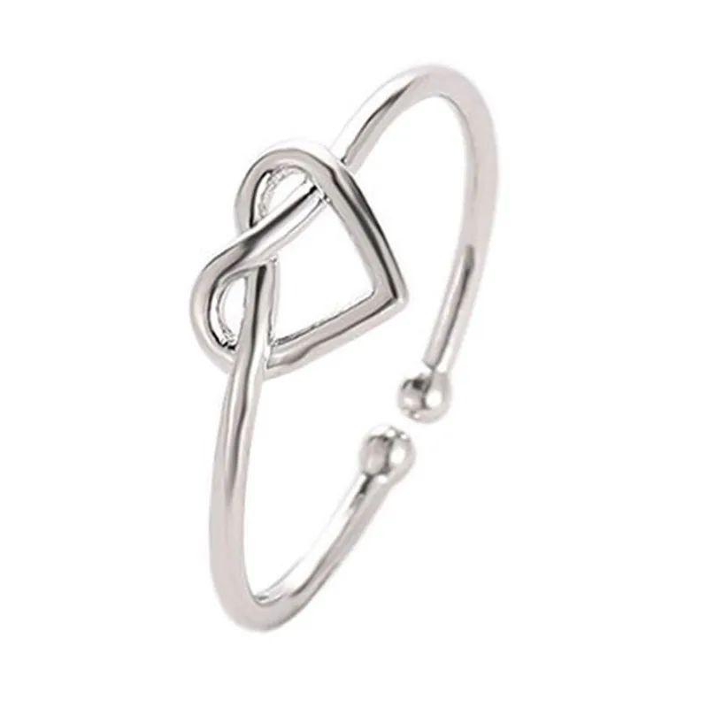 Женское кольцо в виде сердца с узлом|Кольца| |