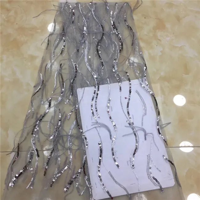 

Nigerian Lace Fabric 2019 High Quality African Tulle Lace Fabric With Sequins Tassel French Net Lace For Wedding Dress New X4