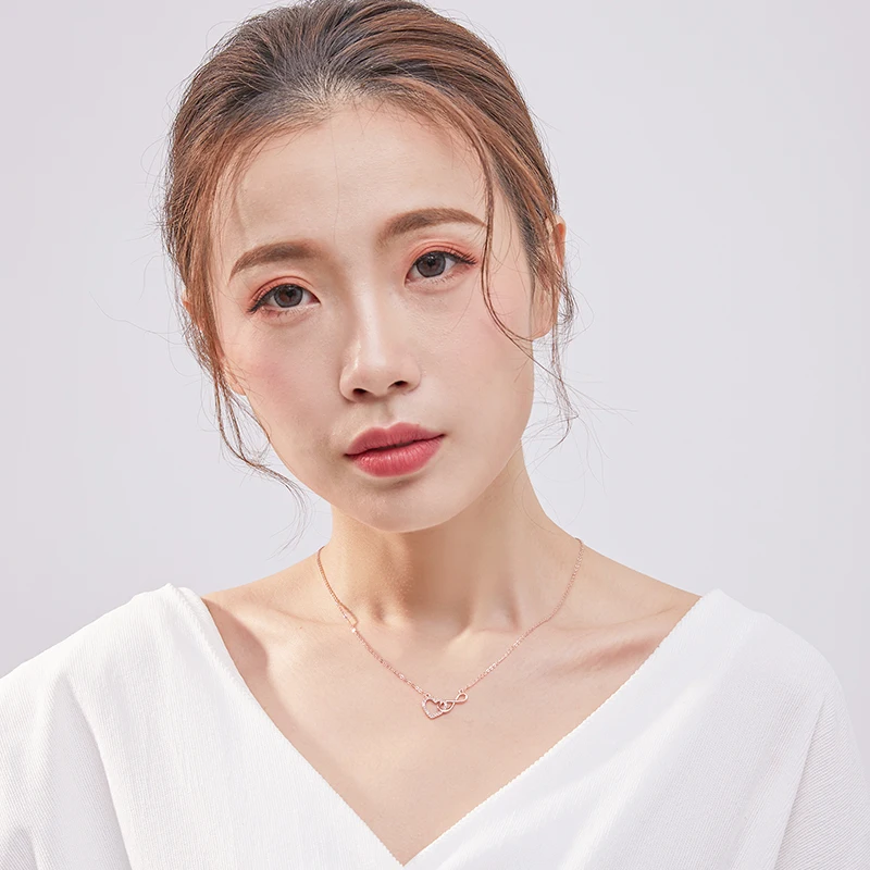 Xinwei wholesale Small love necklace female hollow heart pendant clavicle chain simple ins cold lover gift | Украшения и