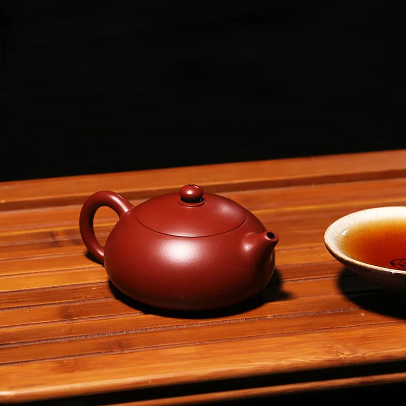 

Yixing recommended all hand undressed ore mud dahongpao zhu bian xi shi pot teapot kung fu tea set