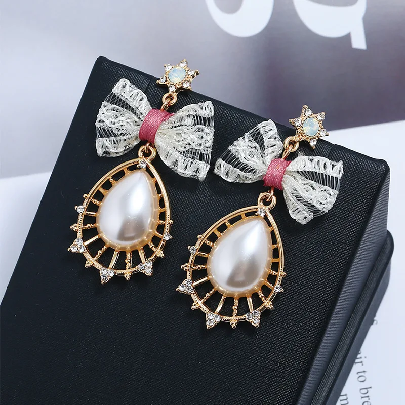 Полые капли воды Длинные Висячие Серьги Свадебная вечеринка Crystal Pearl Bowknot Модные