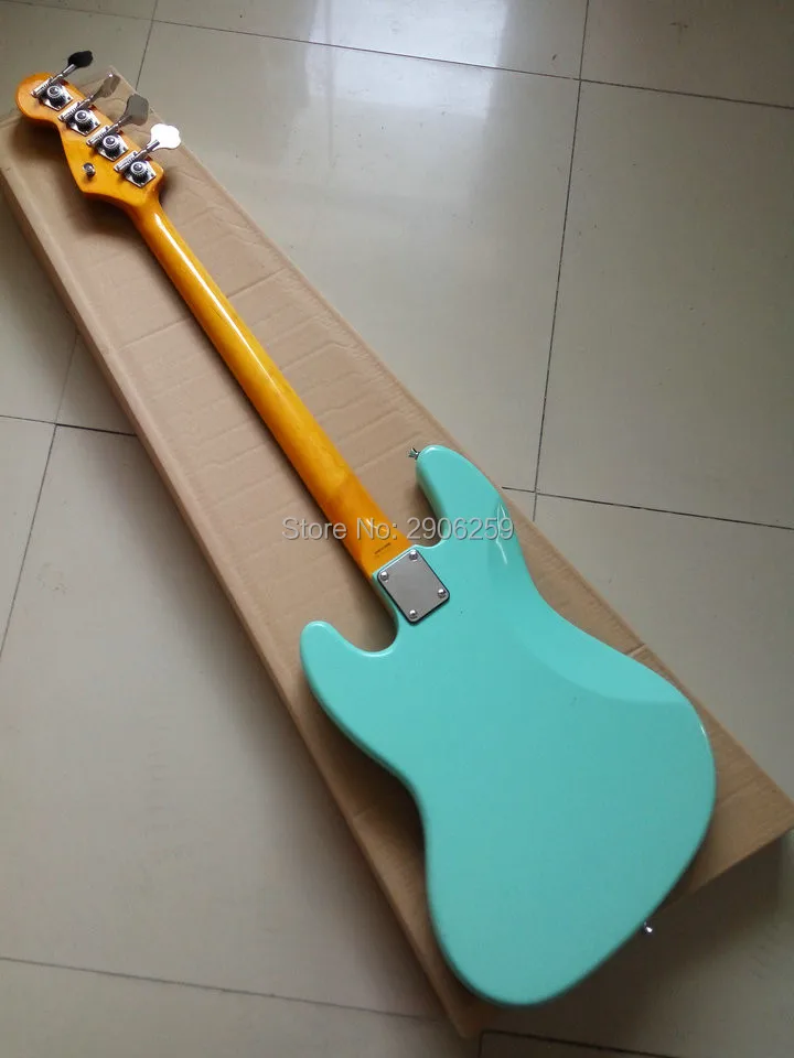 

hot sale jazz bass guitar,green bass guitar,made in China. Korea pickups.ebony fingberboard
