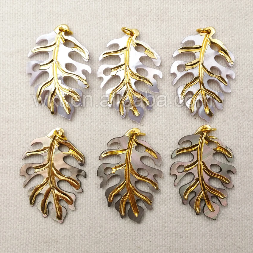 

WT-P1089 Wholesale Natural Shell Leaf Pendant with 24k gold trim , Unique Shell Pendant Design Carved Leaf Gold Pendants