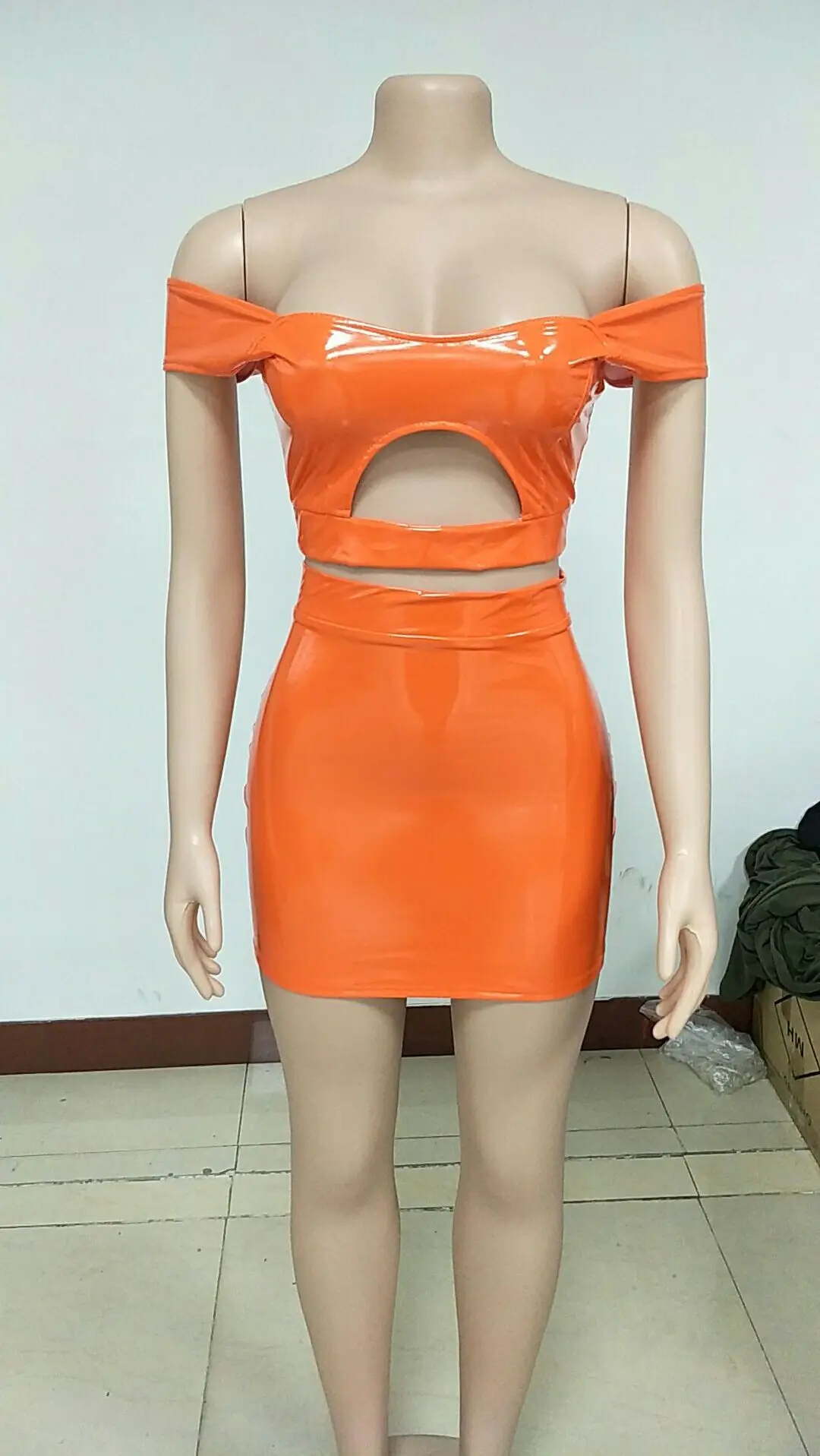 

Solid PU Leather Skirt Suit Women Sexy Hollow Out Off Shoulder Short Sleeve Top And Bodycon Mini Skirt Night Club Party Outfits