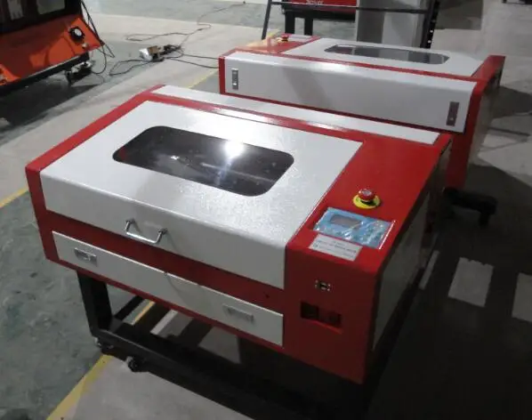 60 Вт МДФ Лазерная резка машина с Авто вверх и вниз сотовой рабочий стол |