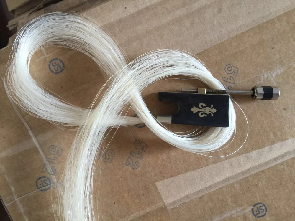 

Ebony Violin bow frog installed horse hair copper mounted