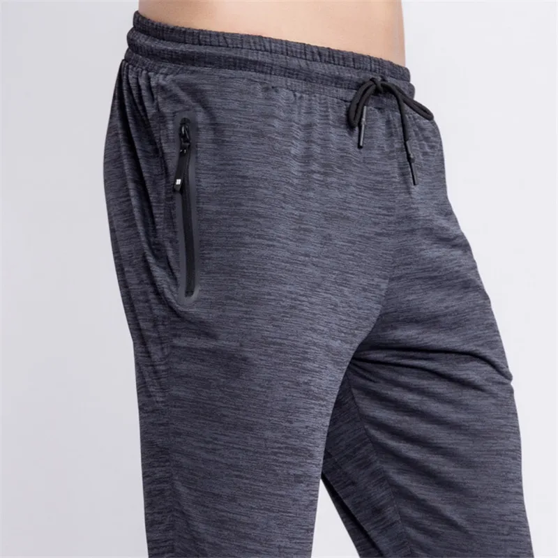 

Quick Dry Men Pants Breathable Zipper Man Gyms Workout Fitness Cotton Trousers Male Casual Fashion Skinny Track Pants Men Jogger