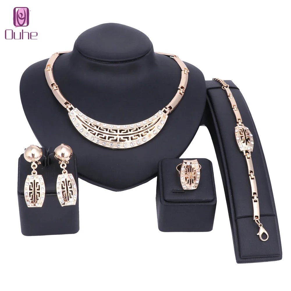 Комплект из колье серёг и браслета золотого цвета| |