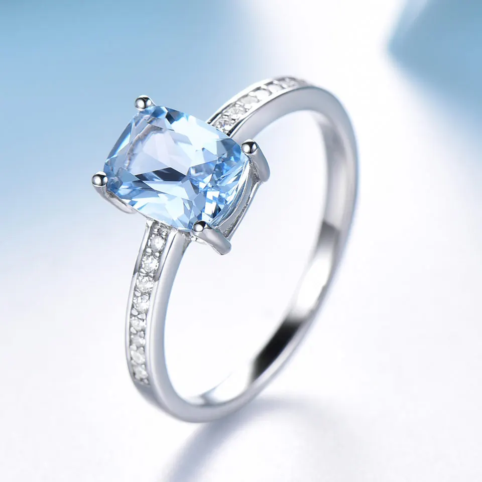 Комплект колец и серег из серебра 925 пробы с голубым топазом | Украшения