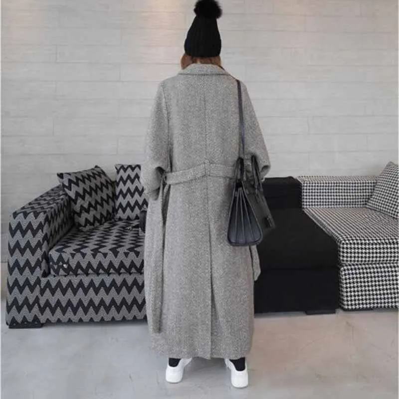 Женское шерстяное пальто с разрезом на подоле длинное поясом верхняя одежда