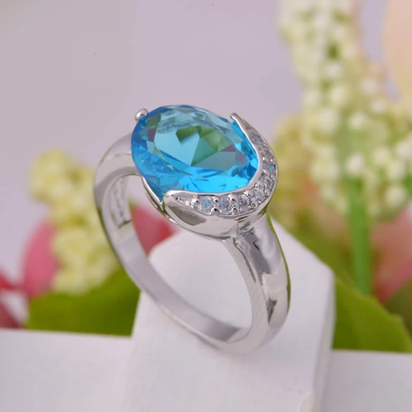 Необычные подарки ко дню Святого Валентина кольца с овальным голубым камнем