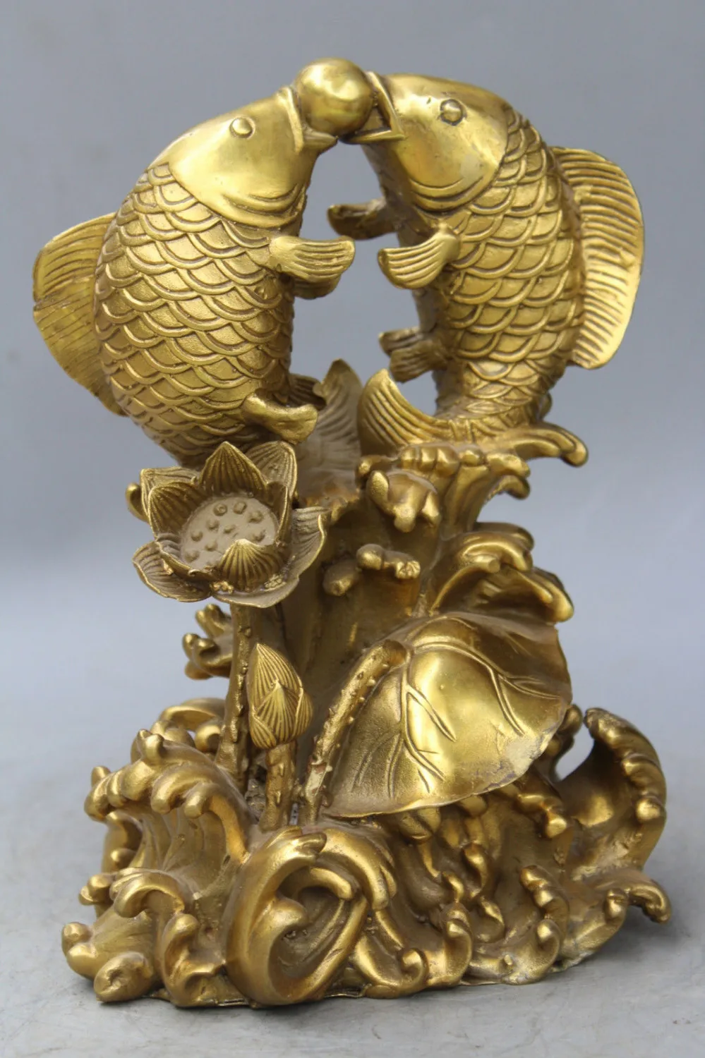 

Lucky Chinese Pure Brass Two Fish Play Ball On Auspicious Lotus Leaf Statue