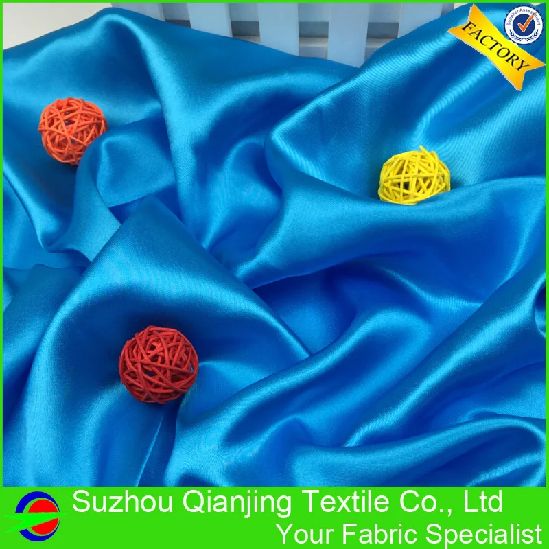 Блестящая гладкая мягкая кислота синяя полиэфирная атласная ткань высокого
