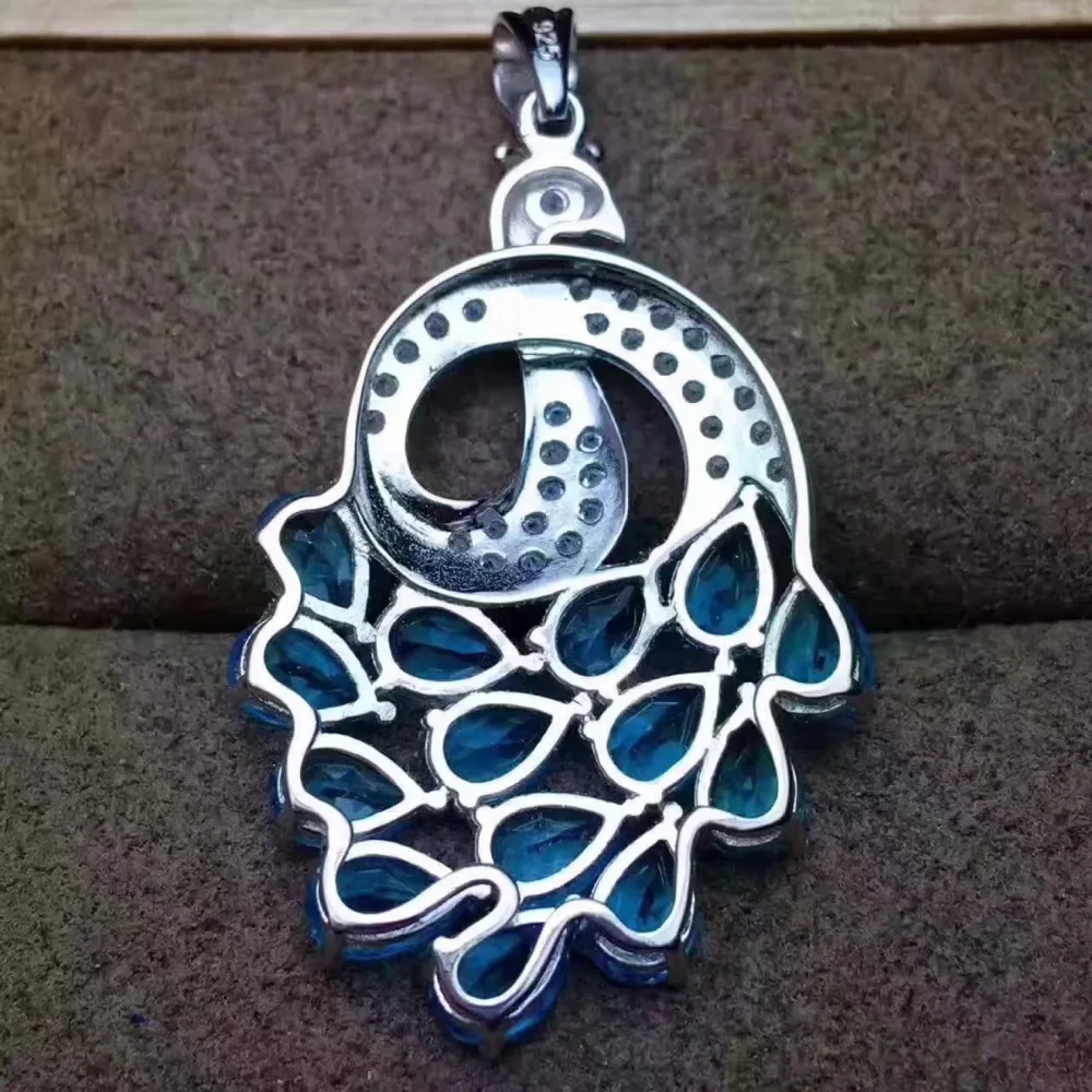 Подвеска Феникс из серебра s925 пробы натуральный голубой топаз 4*6 мм