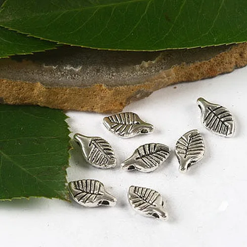 

100pcs Tibetan silver color 2sided leaf charms H2465