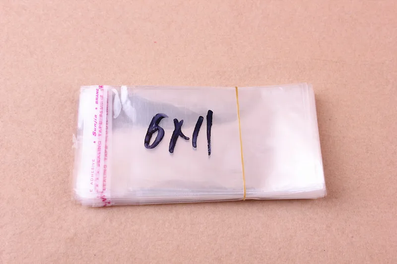 

100pcs high quality OPP Poly Self Adhesive BAG jewelry gift bags 6*11cm