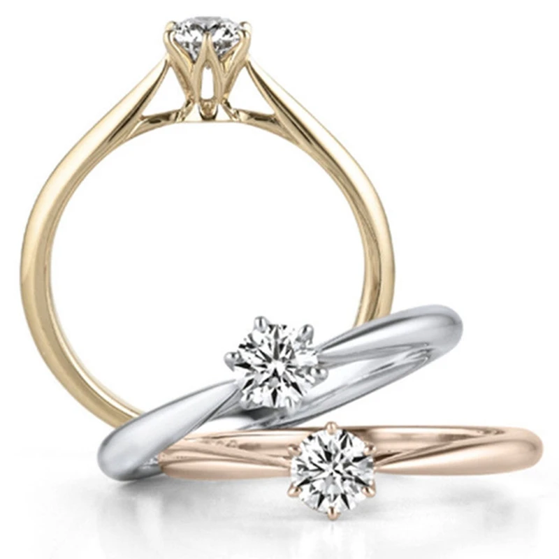 Женское Обручальное кольцо белое/розовое с шестигранным кубическим цирконием 1