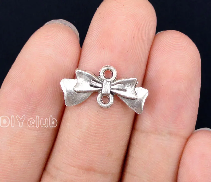 

100pcs- Antique Silver Bow Connector Charms 20x10mm