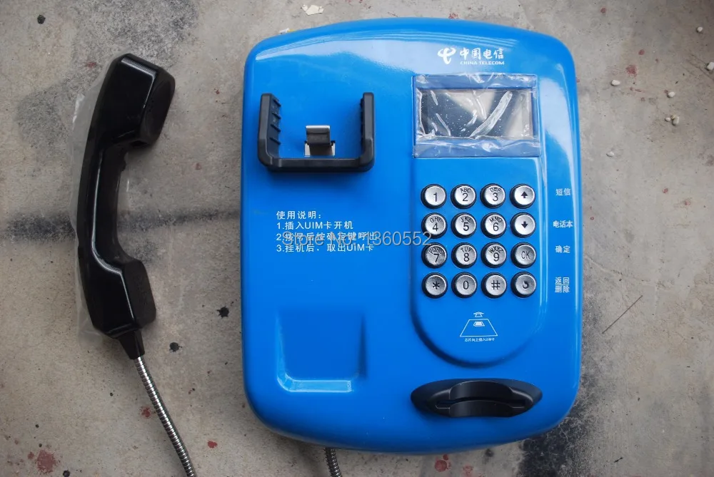 Проводной промышленный телефон квадратной формы с спиральным шлангом и