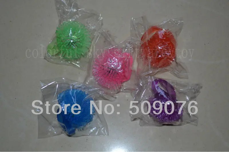 

Free shipping 1152pcs/lot led finger light Flashing Colorful LED Light Up flower Rubber Rings Finger Toys for Party favor