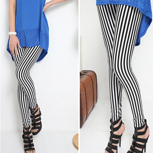 Модные женские черно белые леггинсы с вертикальными полосками обтягивающие