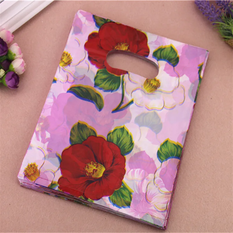 

2021 New Design Wholesale 100pcs/lot 20*25cm Luxury Artical Gift Packaging Bags With Handle Plastic Present Bags