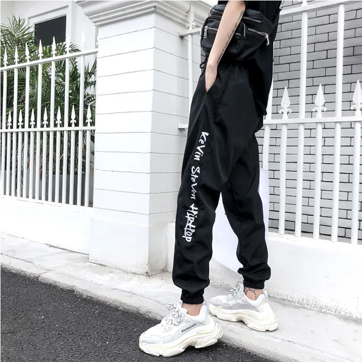 CheerSolo хип-хоп свободные штаны женские Harajuku фиолетовые спортивные штаны Боковые Полосатые с буквенным принтом черные брюки уличный стиль