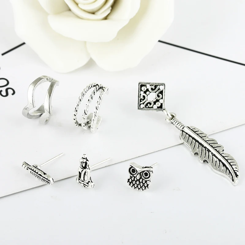 Женские серьги-каффы в стиле панк рок с цепочкой виде листика кисточками