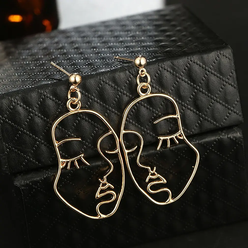 Серьги подвески с абстрактным вырезом для лица уникальный дизайн эффектные