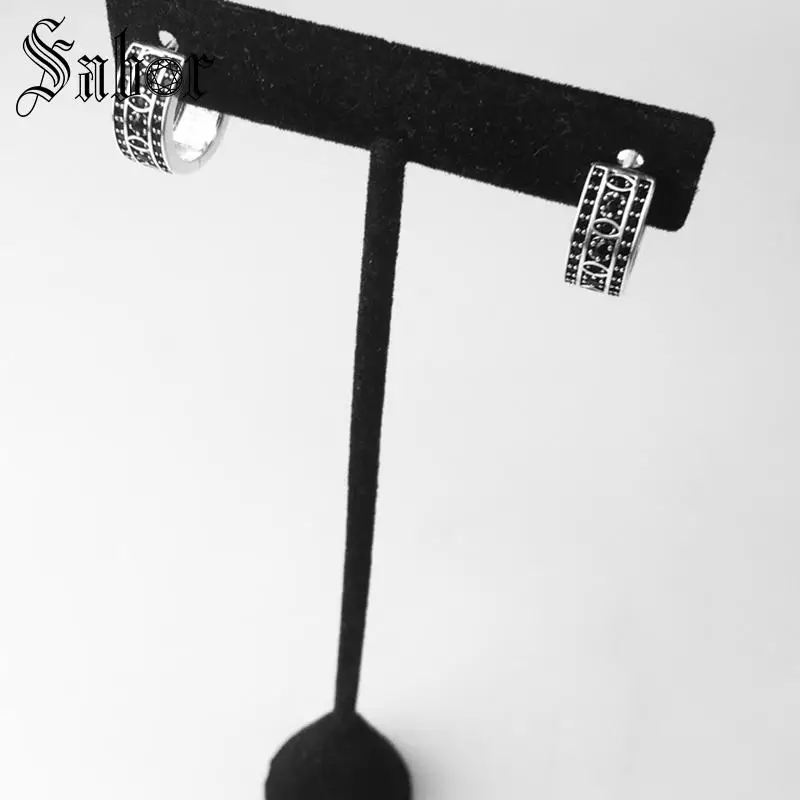 Серьги кольца с креольским ромбом и фианитом серебристого цвета