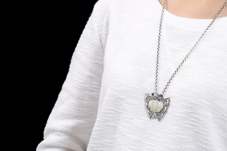 

KJJEAXCMY Fine jewelry S990 pure silver peacock peacock hollowed mosaic jade blue sand stone Hong Kong Jade Pendant