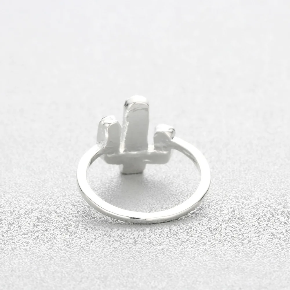 Женское кольцо из меди ручной работы с голубыми кристаллами в виде пустыни