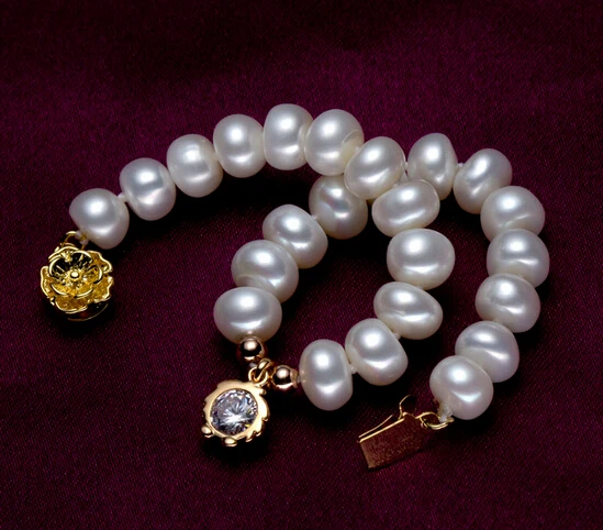 Оригинальные бусины из пресноводного жемчуга имеют скрученные булочки на пару 8-9