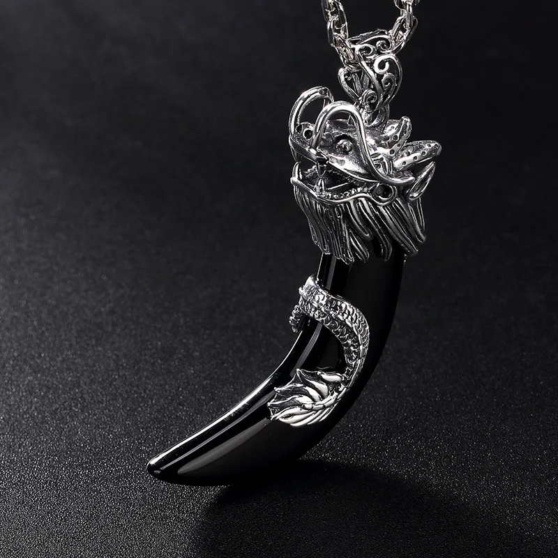 

pure silver jet pulp bibcock dragon teeth to restore ancient ways personality domineering joker men pendants wholesale