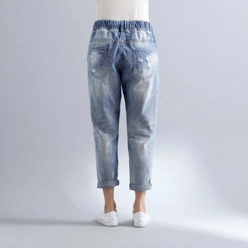 Большие размеры женские летние джинсы с Гаремные штаны дырками 2019 модные
