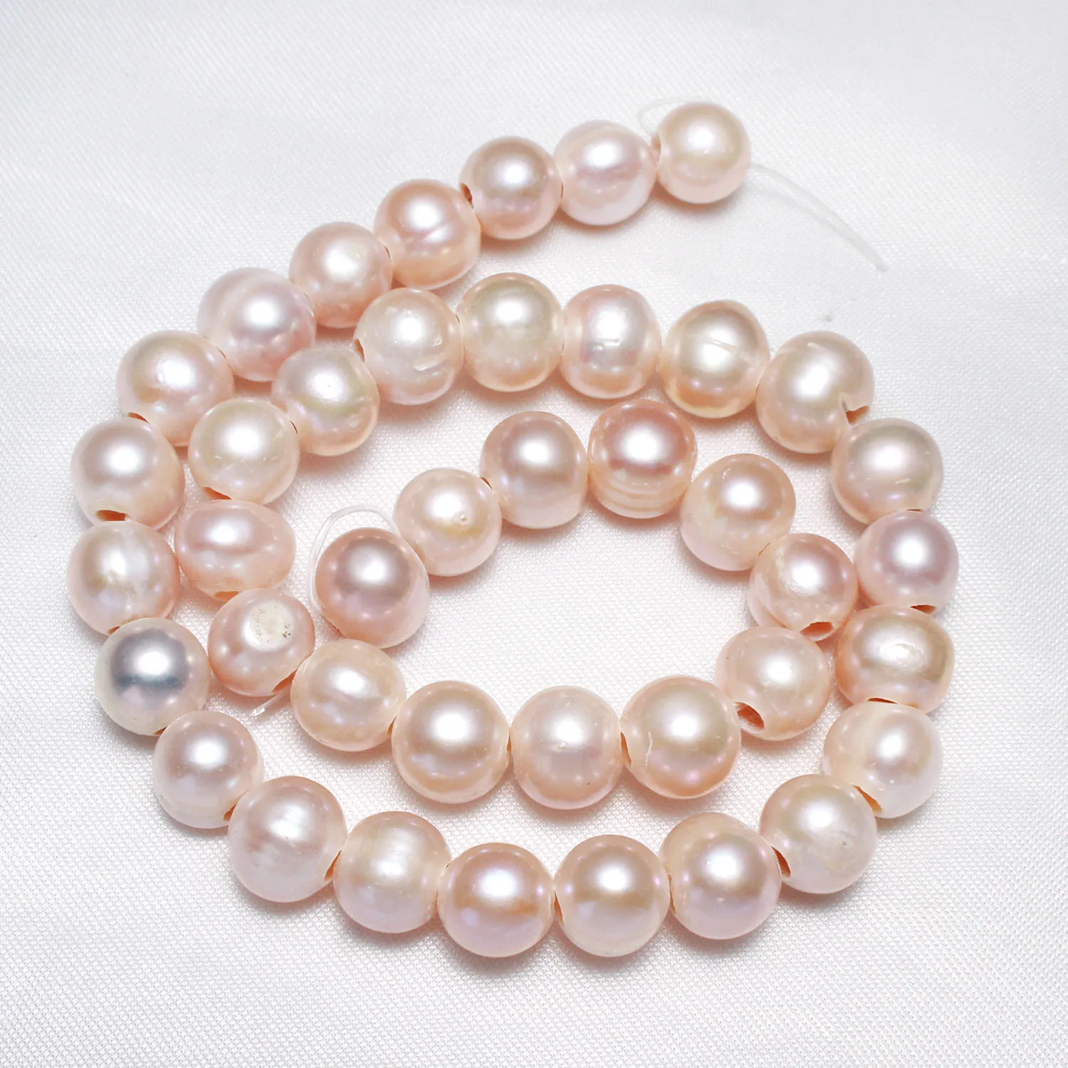 

Cultured Potato Freshwater Pearl Beads Natural 10-11mm Approx 2.5mm Sold By Strand