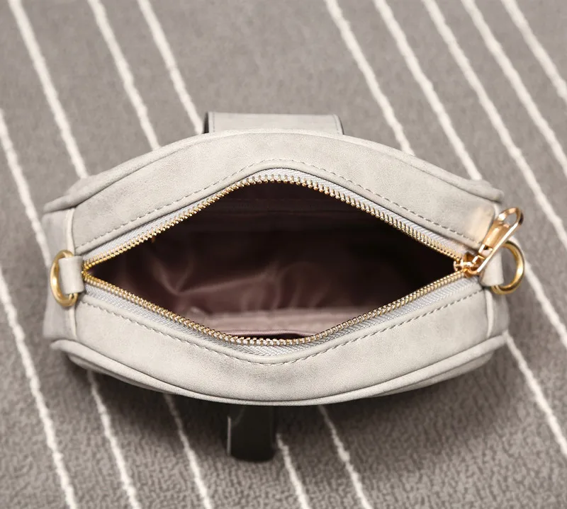 package the new spring 2019 vintage frosted small shoulder bag but round lady inclined |