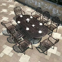 set of 9cps outdoor furniture solid cast dining set oval table and 8 chairs in the yard or garden bronze color