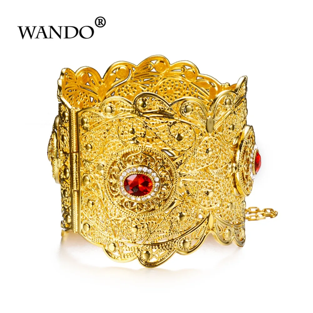 Женский широкий браслет WANDO массивный золотистого цвета с камнем в