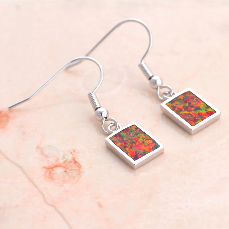 Женские прямоугольные серьги-подвески ROLILASON с коричневым огненным опалом |