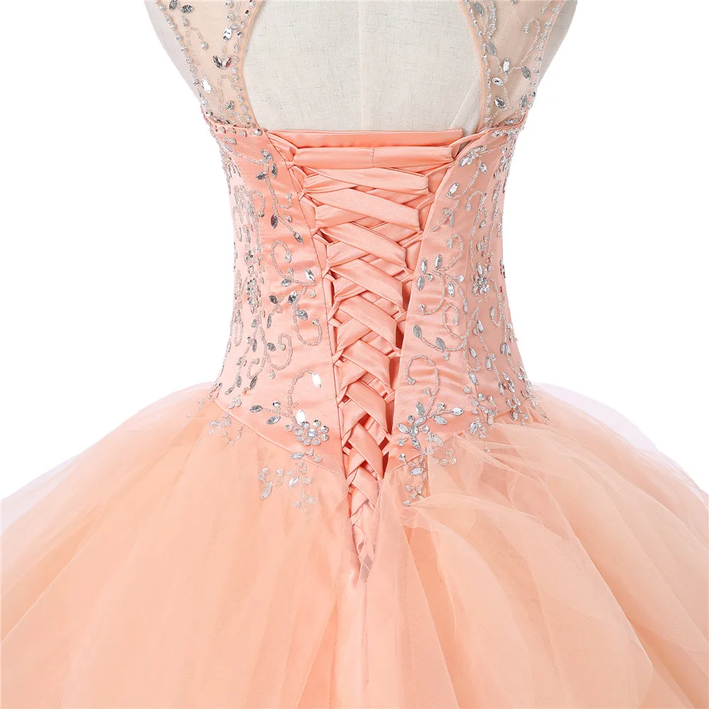 

Peach Vestido Quinceanera Dresses Ball Gown Sweetheart Cap Sleeves Tulle Beaded Crystals Cheap Sweet 16 Dresses