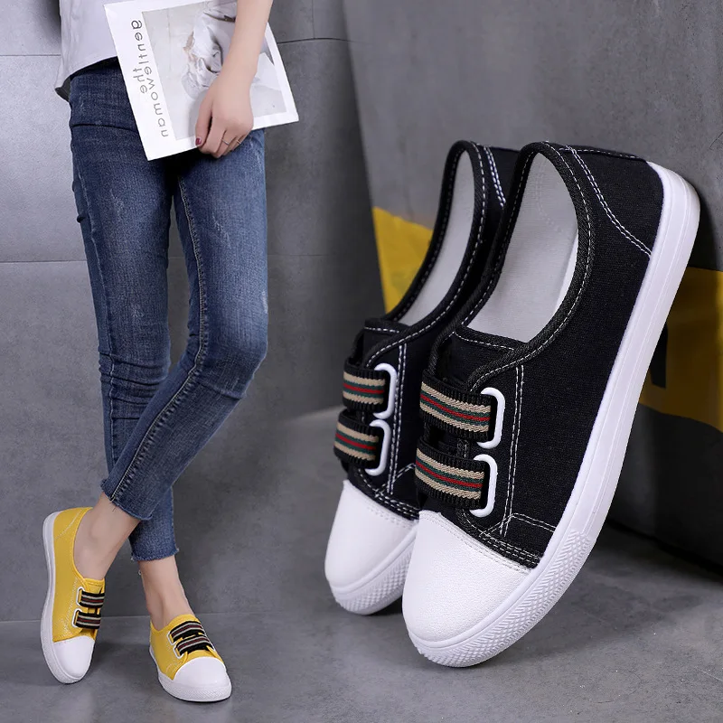 Женские парусиновые кроссовки повседневные белого цвета на плоской подошве в