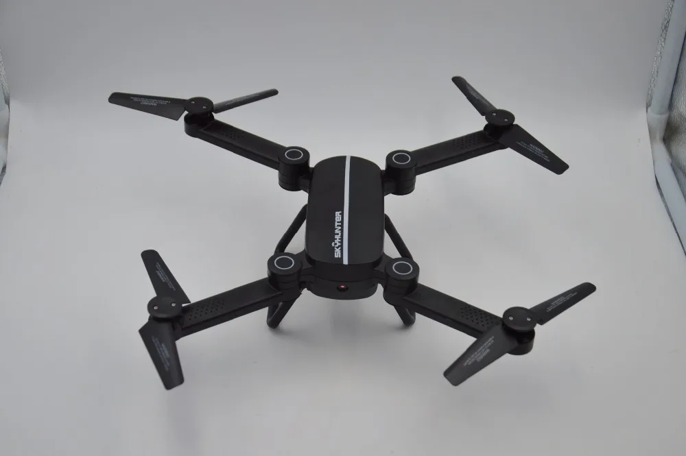 Оригинальный квадрокоптер с Wi-Fi FPV камерой 0,41 Мп, складной, с удержанием высоты и без головы X8TW.