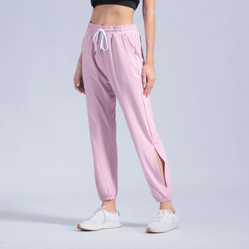 Тонкие спортивные штаны женские свободные для йоги тренировок фитнеса стрейч