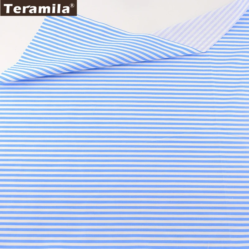 Хлопчатобумажная ткань с принтом в синюю полоску саржевая четверть жира