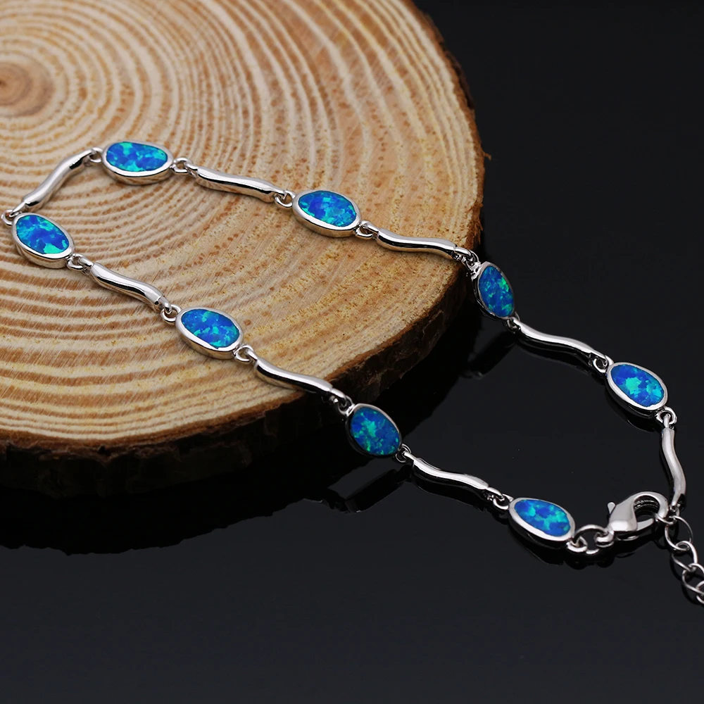 Браслеты женские посеребренные с синим и коричневым огненным опалом SL208 |